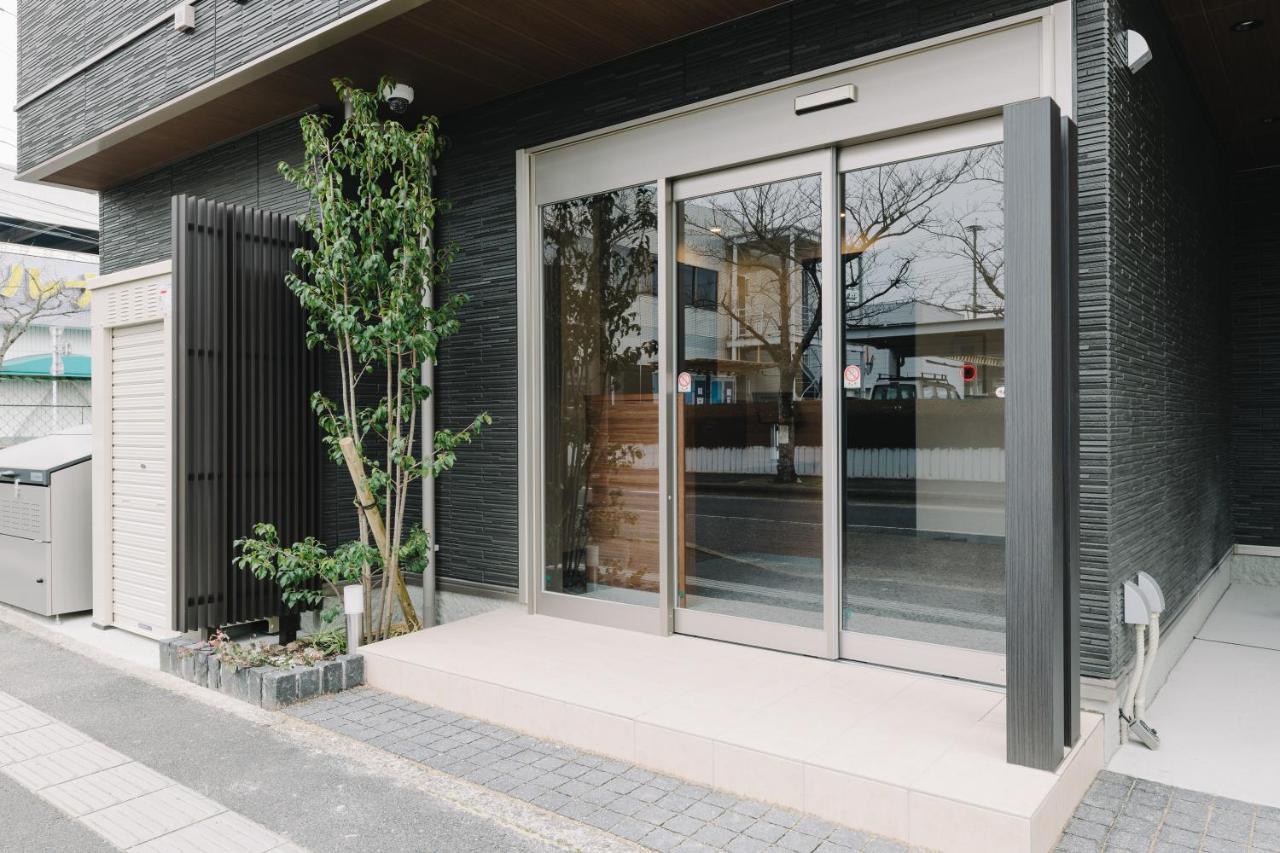 Апарт отель Grand Base Karatsu Ekiminami Экстерьер фото